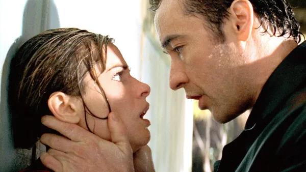 Amanda Peet and John Cusack in Identity