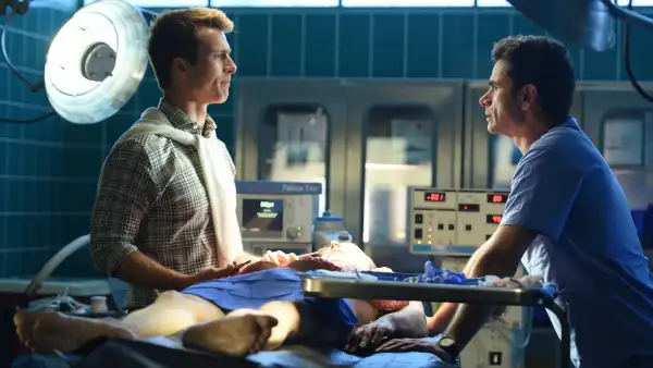 Glen Powell and John Stamos in Scream Queens season 2