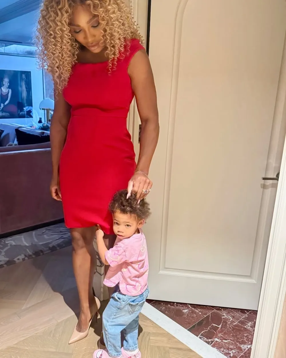Serena Williams&rsquo; Daughter Hilariously Photobombs Her While Posing in a Hot Red Dress