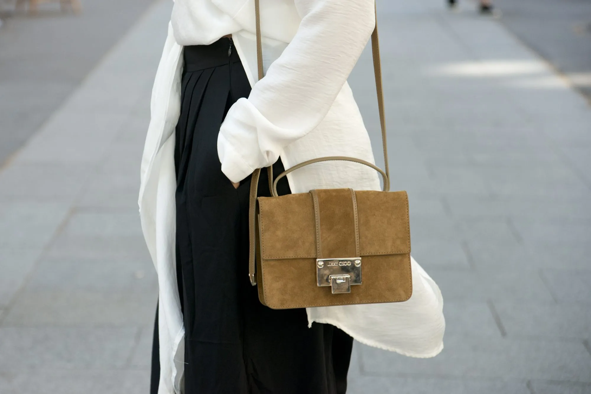 PARIS, FRANCE - OCTOBER 3: Fashion Blogger Julia Haghjoo wears a Asos top, Tibi trousers, and Jimmy Choo bag on day 5 during Paris Fashion Week Spring/Summer 2016/17 on October 3, 2015 in Paris France. (Photo by Kirstin Sinclair/Getty Images)