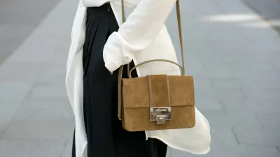 PARIS, FRANCE - OCTOBER 3: Fashion Blogger Julia Haghjoo wears a Asos top, Tibi trousers, and Jimmy Choo bag on day 5 during Paris Fashion Week Spring/Summer 2016/17 on October 3, 2015 in Paris France. (Photo by Kirstin Sinclair/Getty Images)