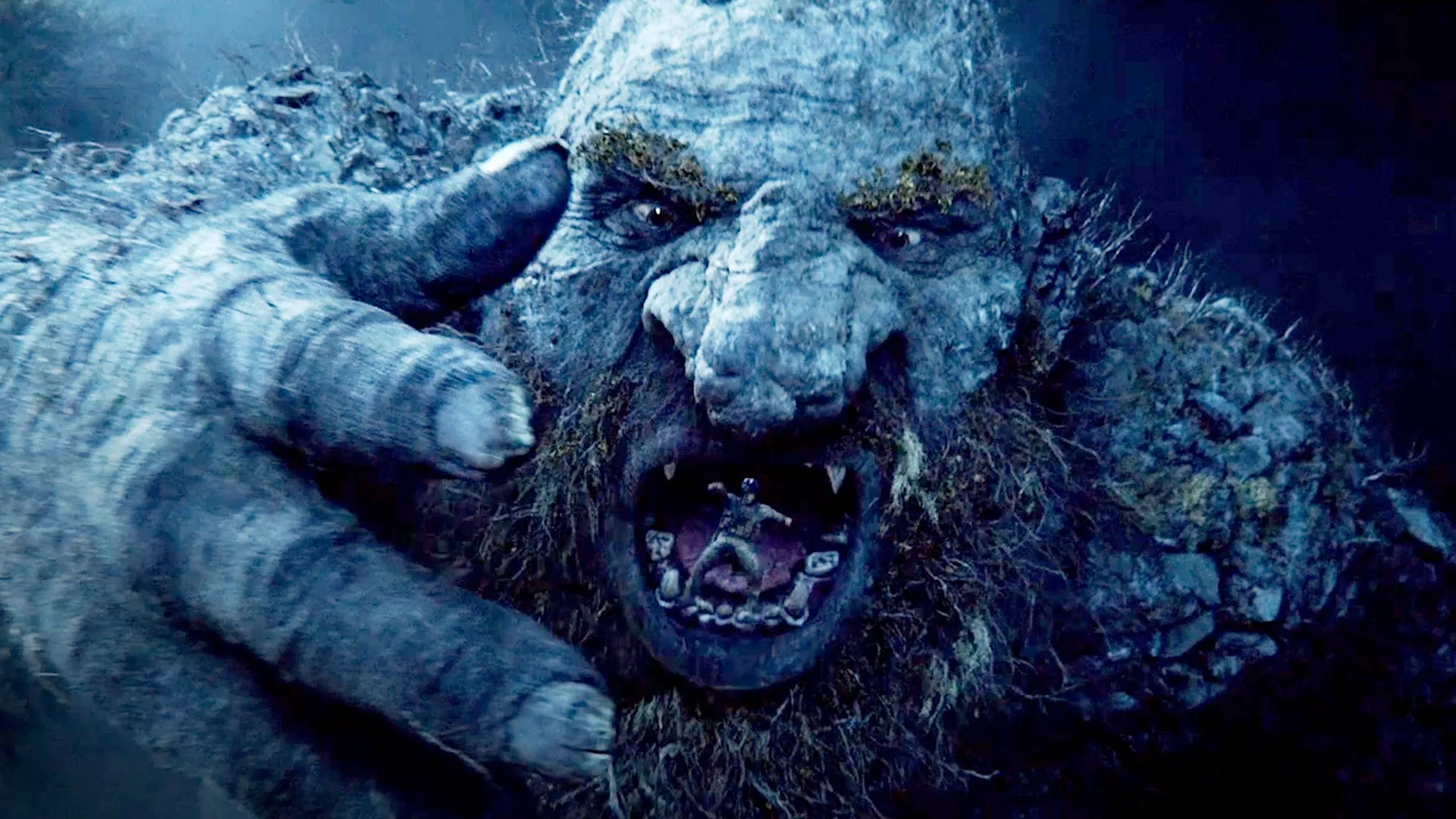 A troll swallows a man in the movie Troll
