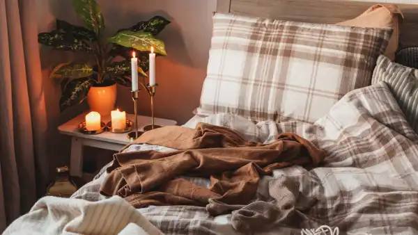 Cozy flannel sheets stacked neatly on a bed for winter comfort.