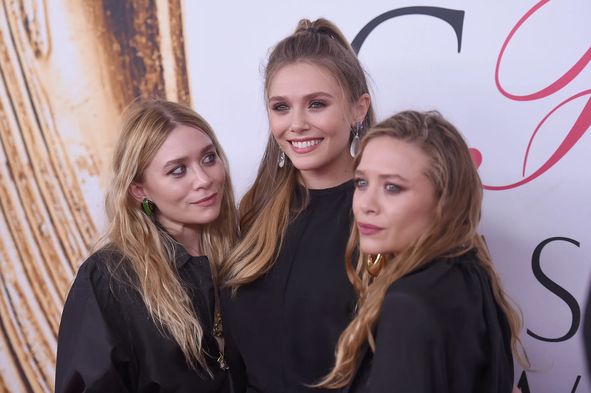 Elizabeth-Olsen-With-MaryKate-and-Ashley-Olsen-GettyImages-538431226