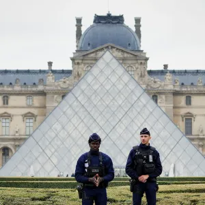 Feature Mugshot of Louvre Robber Is Going Viral