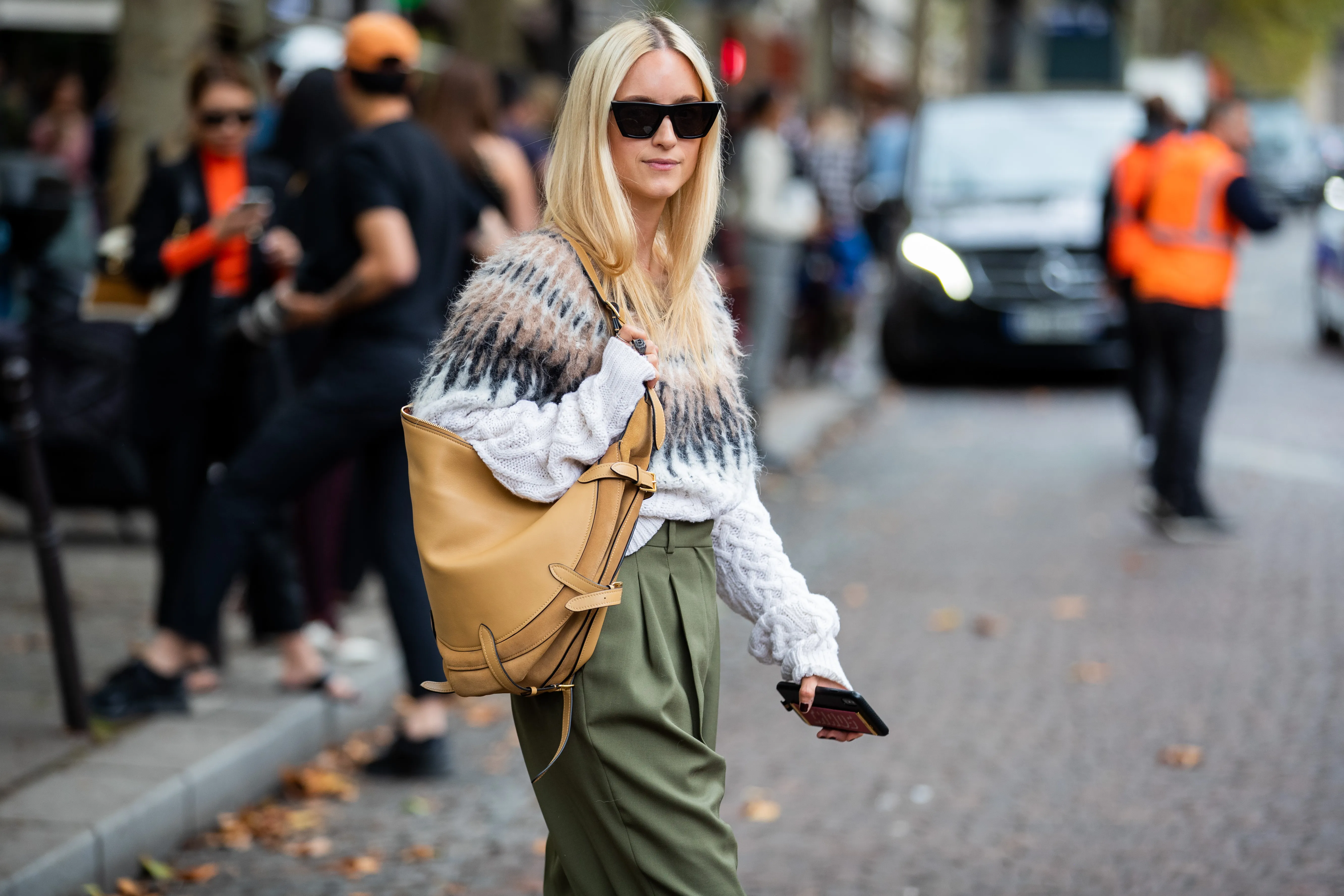 Charlotte Groeneveld seen wearing knit with pattern, brown bag, khaki pants outside Altuzarra during Paris Fashion Week Womenswear Spring Summer 2020 on September 28, 2019 in Paris, France.