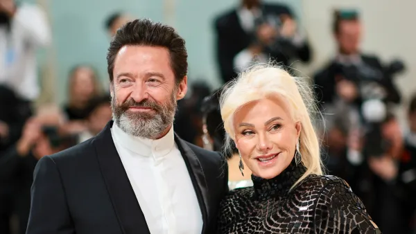 Hugh Jackman and Deborra-Lee Furness posing at the 2023 Met Gala.