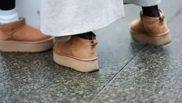 Close-up detail view of brown suede UGG shoes, outside Aeron, during the Copenhagen Fashion Week AW24 on January 30, 2024 in Copenhagen, Denmark.