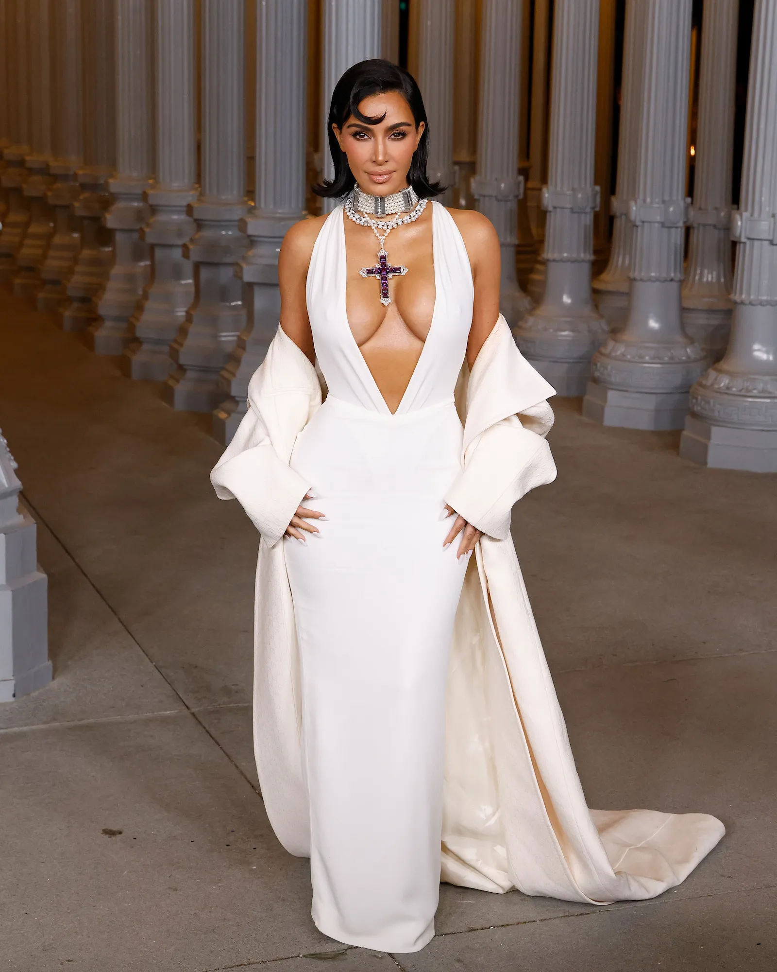 GettyImages-2182576221-Kim-Kardashian-Stuns-in-Naked-Dress-as-She-Poses-Next-to-Sea.jpg