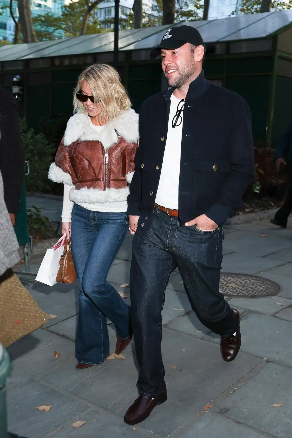 Sydney Sweeney Shows Off Her Chic Autumn Style in Chocolate Brown Mini Dress