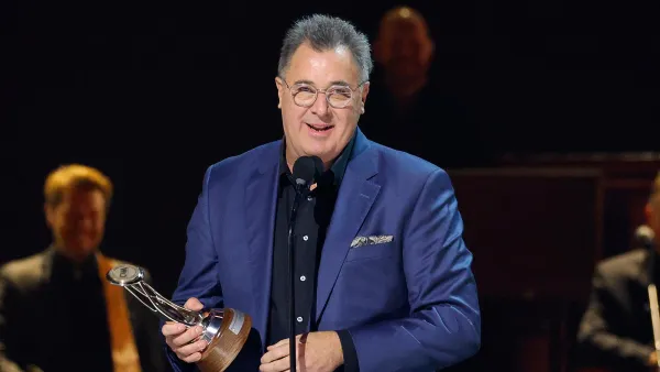 Vince Gill accepts the Lifetime Achievement Award onstage during the 59th Annual CMA Awards 2247564690