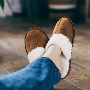 Woman in soft slippers at home, closeup
