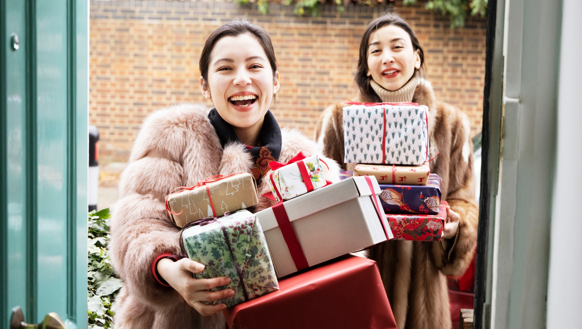 Woman shopping for holiday gifts online and bringing them to a party