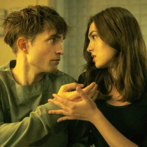 Robert Pattinson and Anamaria Vartolomei in Mickey 17