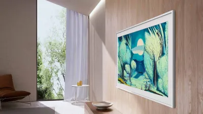 Samsung The Frame TV 65 mounted on a wall displaying artwork