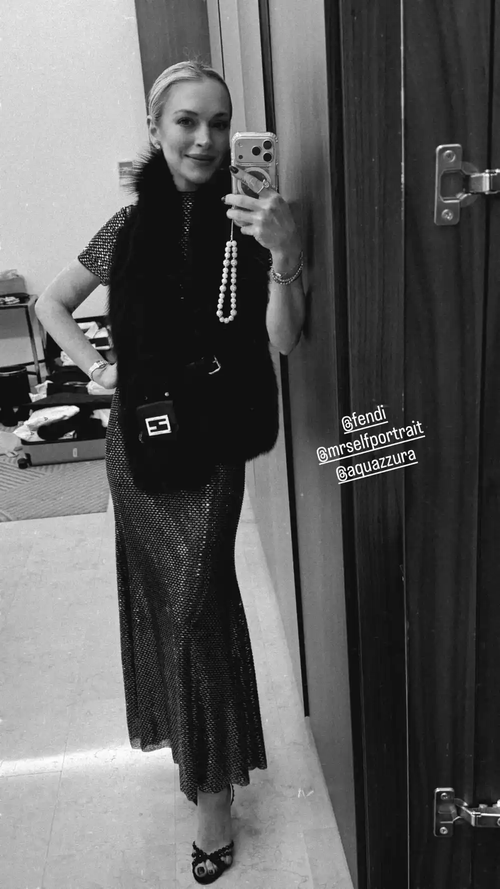 Lindsay Lohan Serves Holiday Chic and Youthful Glow in Rare Photo With Husband Bader Shammas