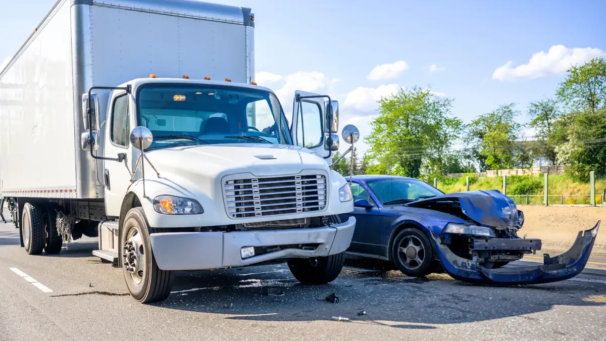 Box truck and sedan collision