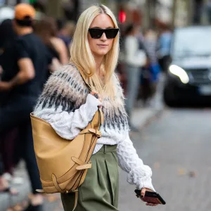PARIS, FRANCE - SEPTEMBER 28: Charlotte Groeneveld seen wearing knit with pattern, brown bag, khaki pants outside Altuzarra during Paris Fashion Week Womenswear Spring Summer 2020 on September 28, 2019 in Paris, France. (Photo by Christian Vierig/Getty Images)