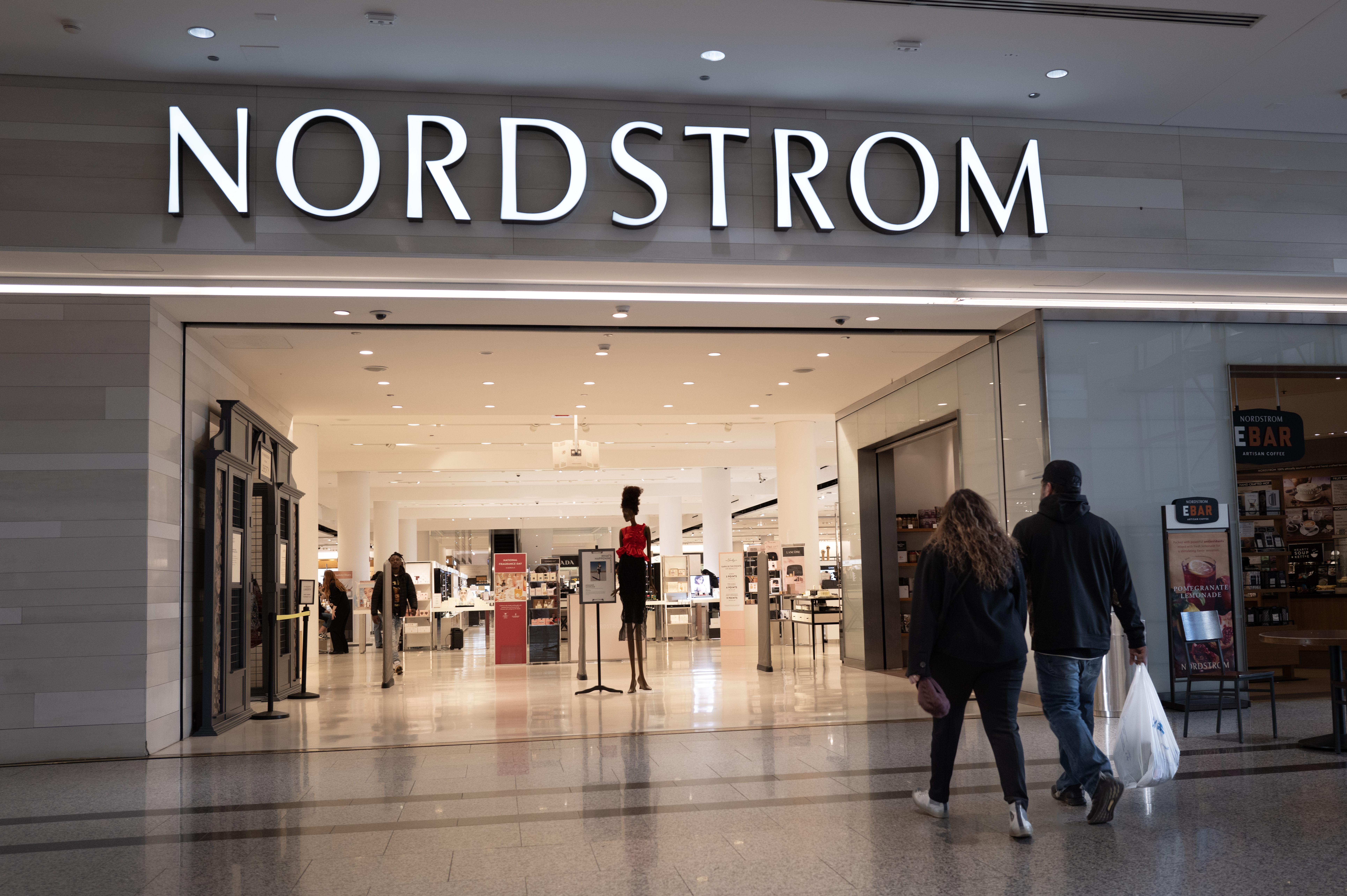 A sign marks the location of a Nordstrom store in a shopping mall on March 20, 2024 in Chicago, Illinois. Nordstrom stock jumped more than 10% recently after a report stated that the retailer is considering going private.