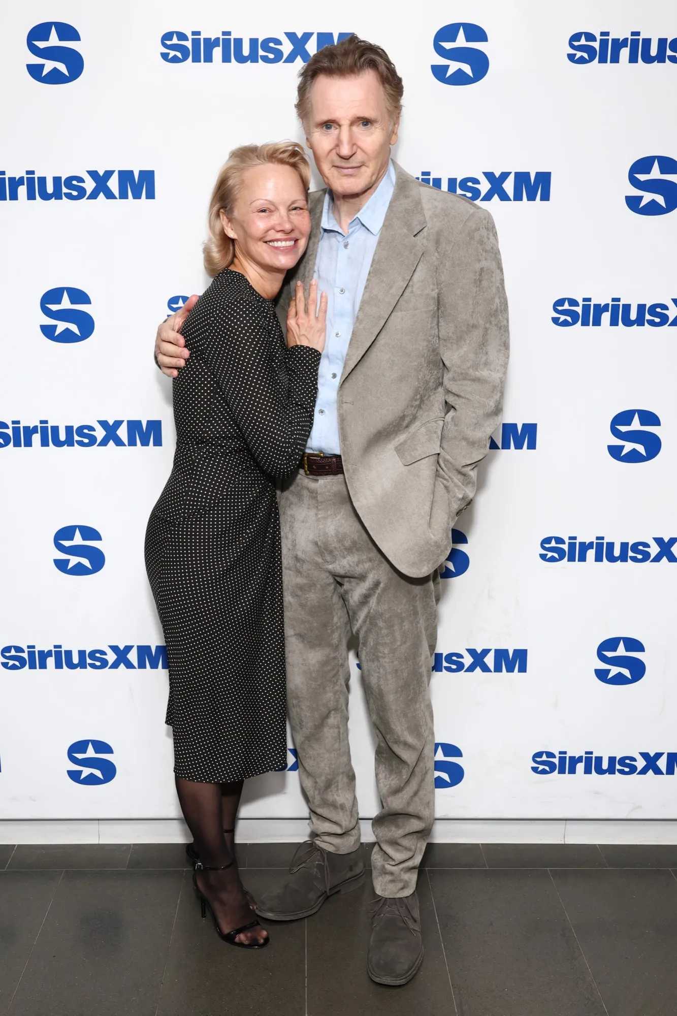 GettyImages-2227746078-pamela-anderson-liam-neeson