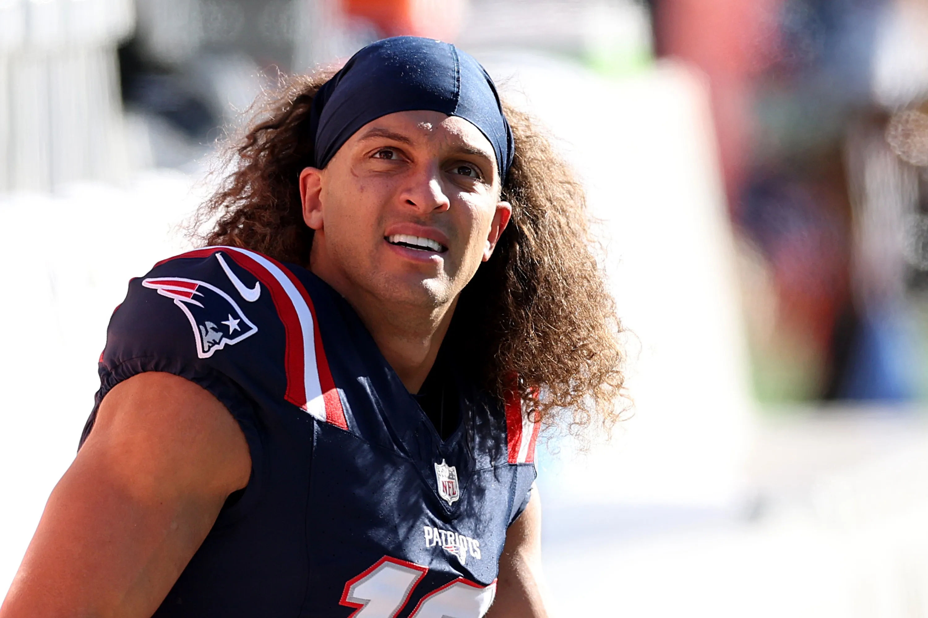 GettyImages-2248398867-Mack-Hollins-Shows-Up-to-Patriots-Game-Barefoot-and-Shirtless-in-Snow