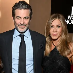 Jennifer Anistons BF Jim Curtis Shows Love to Her Poolside String Bikini Video as Slow Burn Romance Heats Up