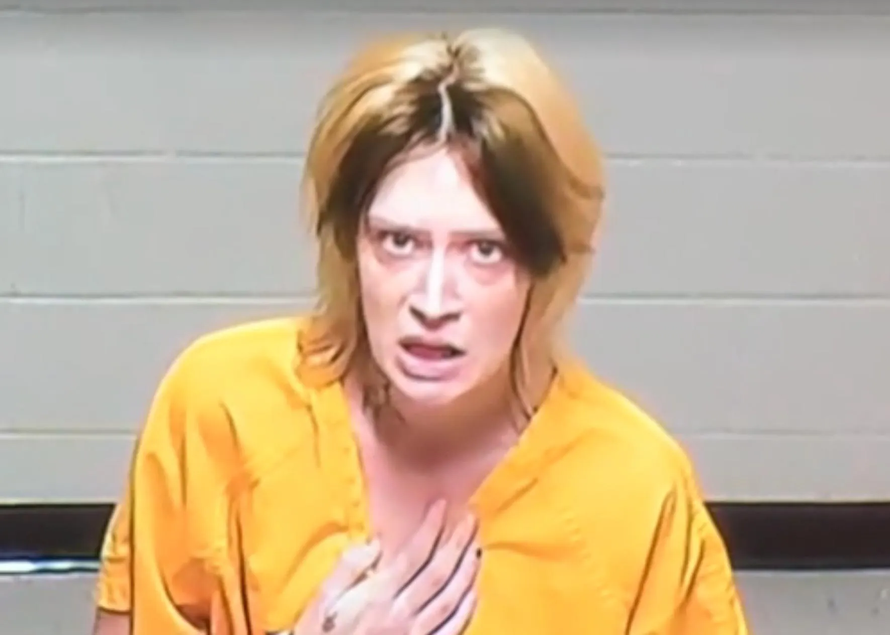 Kansas Mom Accused of Sons Murder Gasps for Air Clutches Chest During Court Appearance