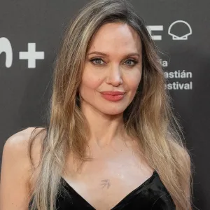 SAN SEBASTIAN, SPAIN - SEPTEMBER 21: Co-producer and actress Angelina Jolie,director Alice Winocour (not seen), actress Garance Marillier (not seen), actor Louis Garrel (not seen), actress Anyier Anei (not seen), and actress Ella Rumpf (not seen), pose on the red carpet before the screening of the film 'The Couture' in the official section of the 73rd San Sebastian International Film Festival at Kursaal Palace in San Sebastian, Spain, on September 21, 2025. (Photo by Javi Julio/Anadolu via Getty Images)