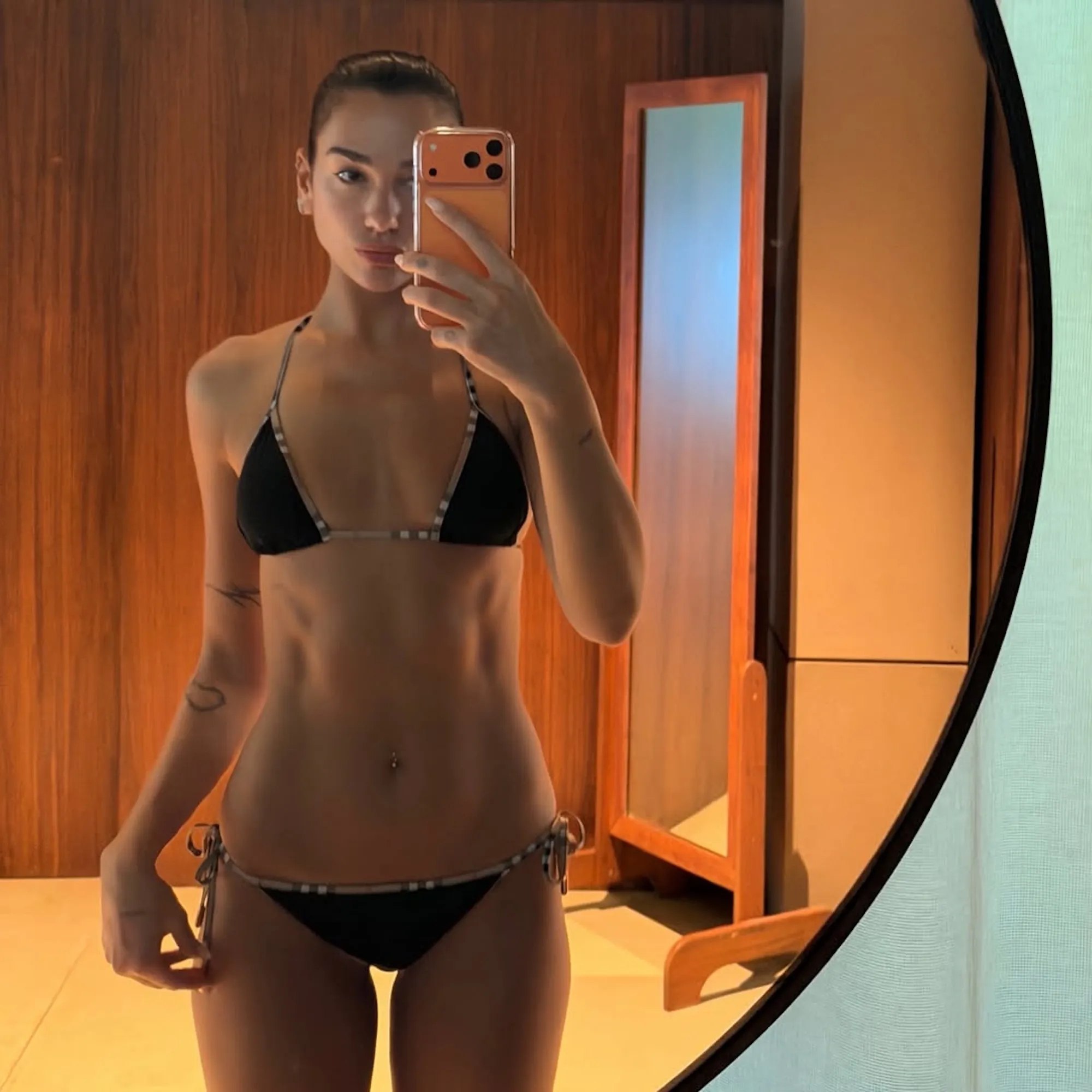 Dua Lipa Wears Ultra Low-Waisted Burberry Bikini While Vacationing With Callum Turner