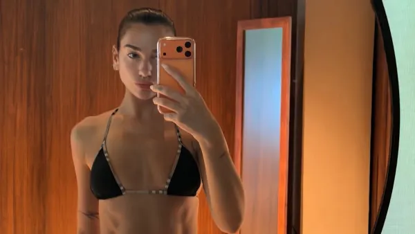 Dua Lipa Wears Ultra Low-Waisted Burberry Bikini While Vacationing With Callum Turner