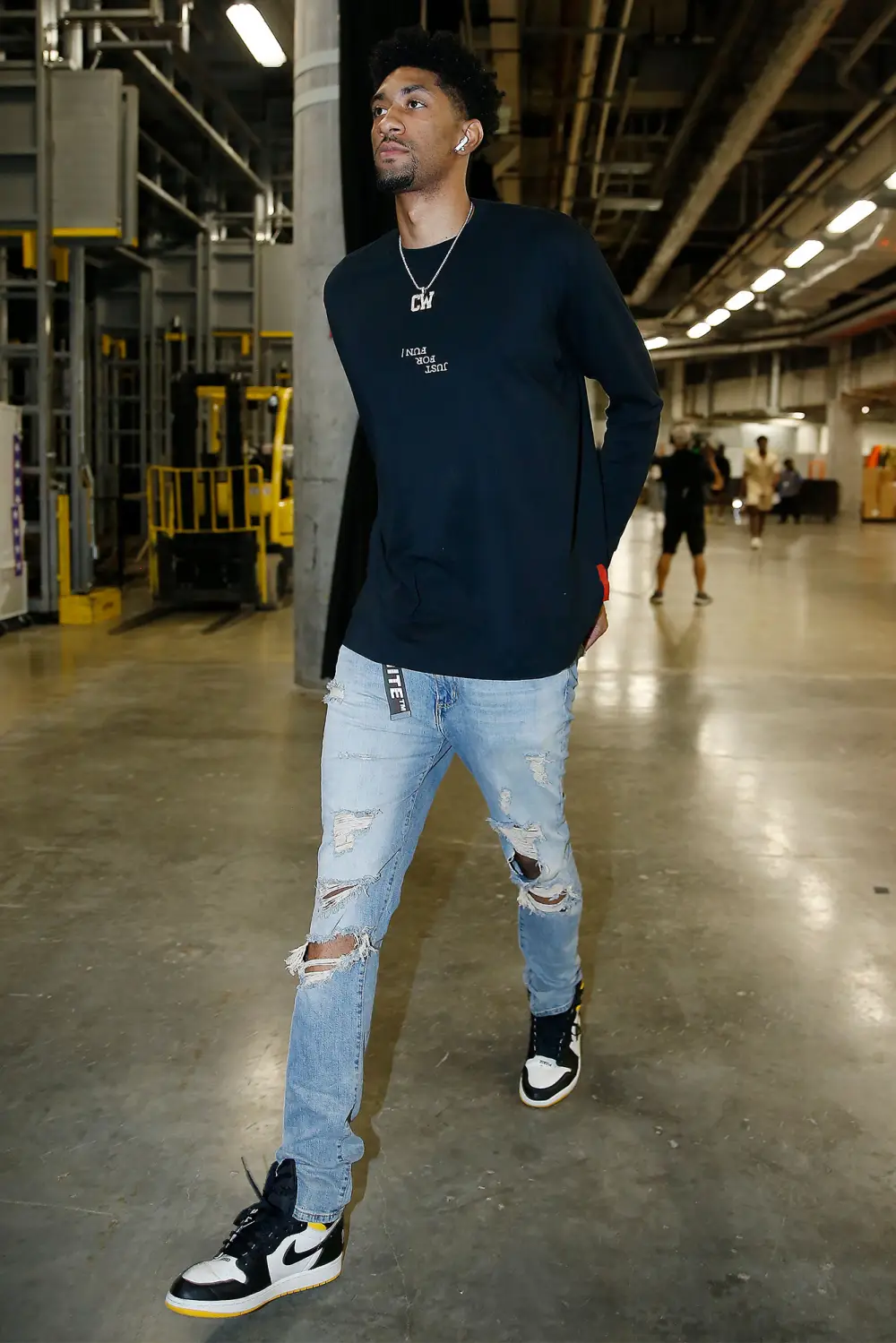 Feature Christian Wood Accuses Ex of Placing Tracking Device in Baby Bag