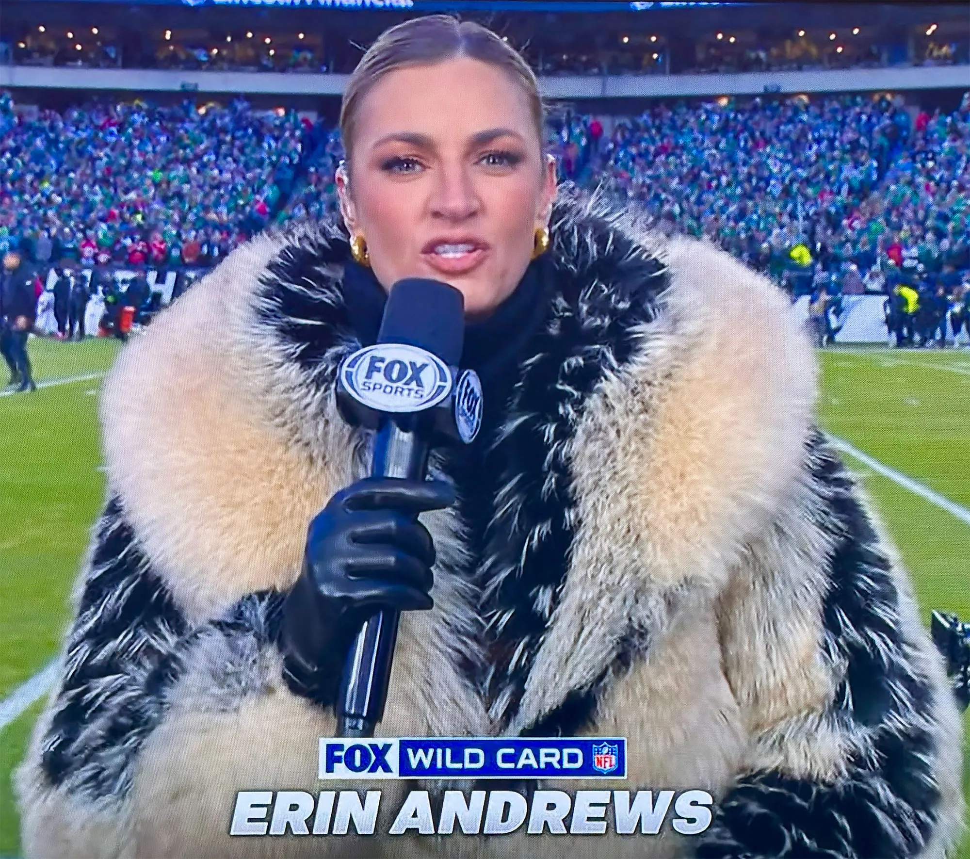 Feature Peta Reacts to Erin Andrews Viral Fur Coat at Playoff Game