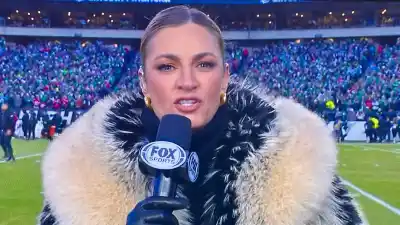 Feature Peta Reacts to Erin Andrews Viral Fur Coat at Playoff Game