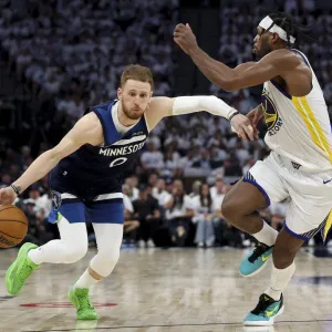 GettyImages-2214607018 Donte DiVincenzo Buddy Hield NBA Delays Timberwolves and Warriors Game After After Minneapolis Shooting