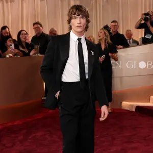 'Heated Rivalry' Star Connor Storrie Debuts Shaggy Hair on 2026 Golden Globes Awards Red Carpet