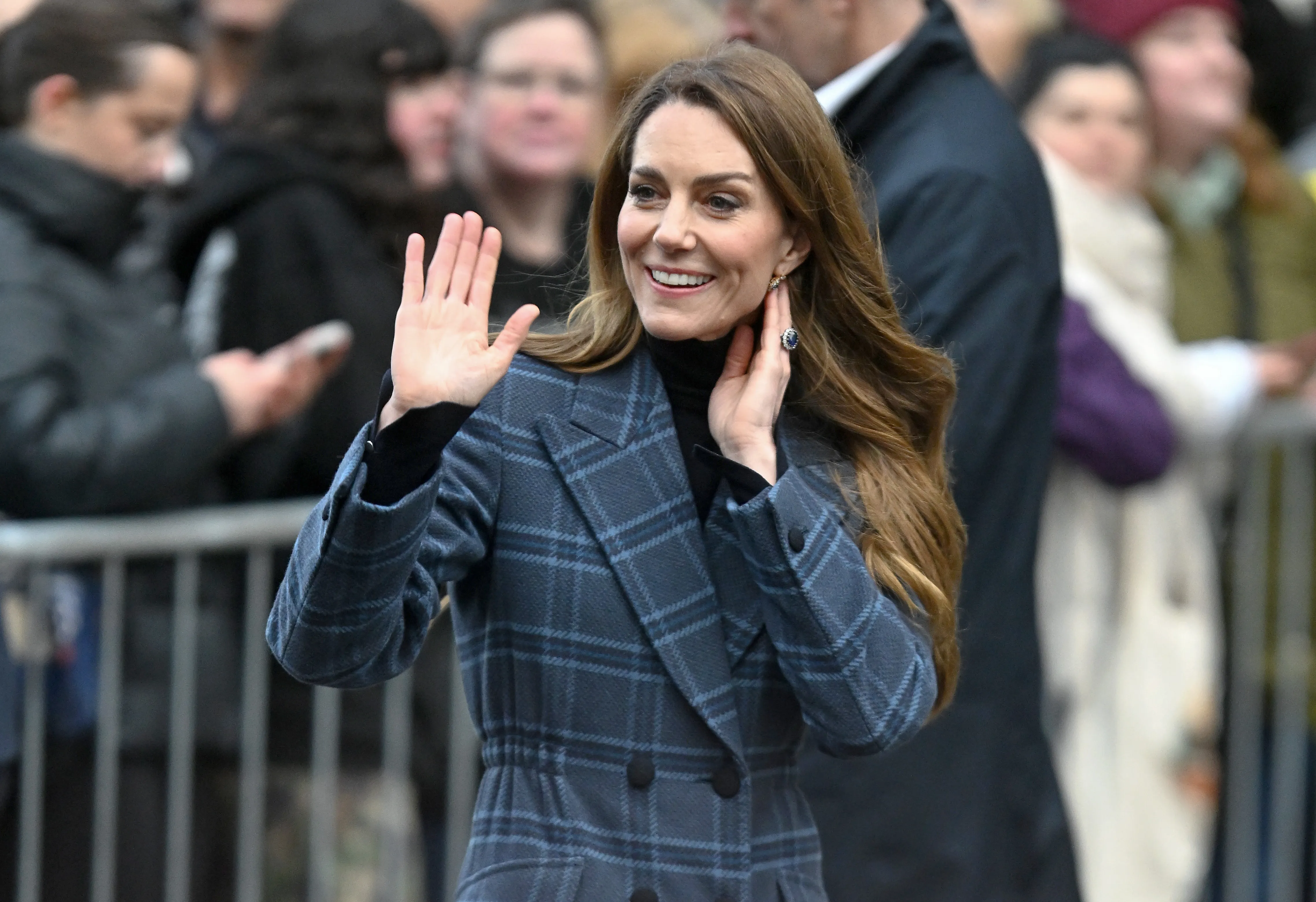 Catherine, Princess of Wales smiles and waves as she departs after visiting Radical Weavers, a working hand-weaving studio and independent charity that aims to help tackle social isolation and support people affected by trauma by offering the opportunity to learn traditional Scottish tartan-weaving skills, on January 20, 2026 in Stirling, Scotland. The Prince and Princess of Wales visited Stirling and Falkirk today to highlight Scottish heritage traditions and the ways in which they connect communities.