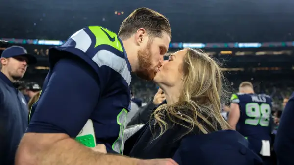 GettyImages-2258211944-sam-darnold-fiancee-kiss