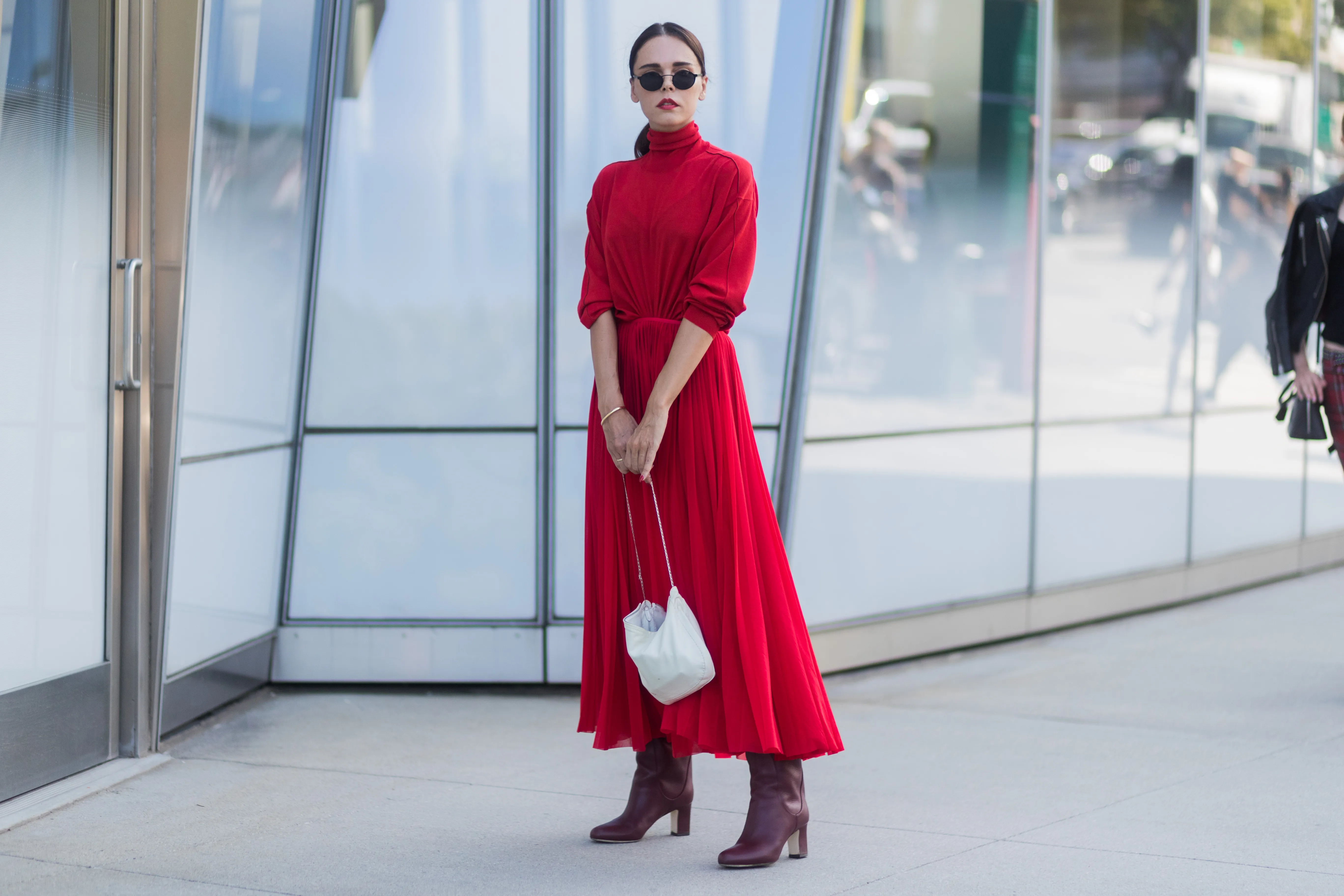 Evangelie Smyrniotaki wearing red dress seen in the streets of Manhattan outside Delpozo during New York Fashion Week on September 13, 2017 in New York City.