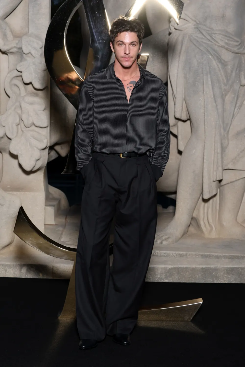 GettyImages2238148744 Who Is Role Model What to Know About the Singer Linked to Dakota Johnson