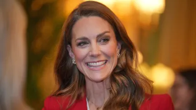 WINDSOR, ENGLAND - JANUARY 15: Britain's Catherine, Princess of Wales smiles as she meets members of the England Women's rugby team at Windsor Castle on January 15, 2026 in Windsor, United Kingdom. The Princess of Wales hosted the team as Patron of the Rugby Football Union to celebrate their World Cup victory in September 2025. (Photo by Kin Cheung - WPA Pool/Getty Images)