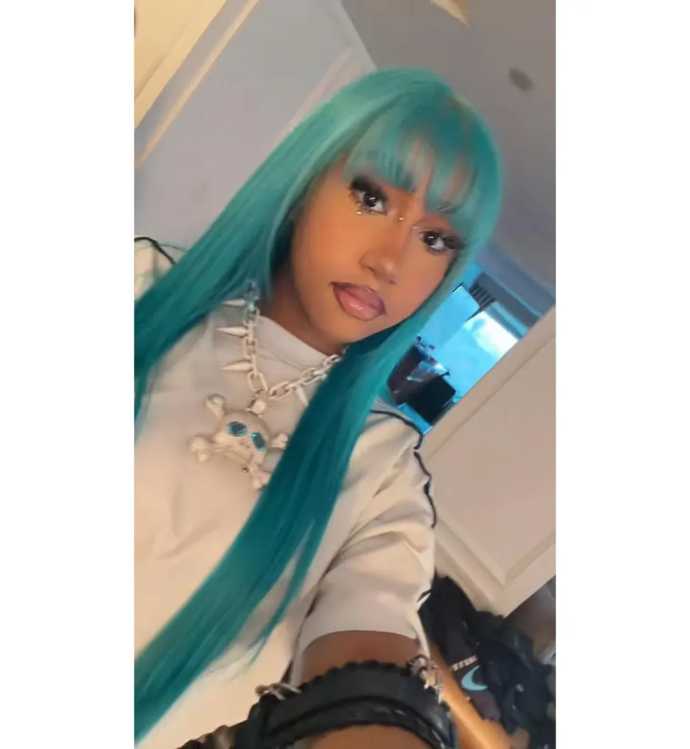 North West Debuts Bridge Piercing and Black Grills in TikTok With Her Flashy 106 Carat Necklace tg 2