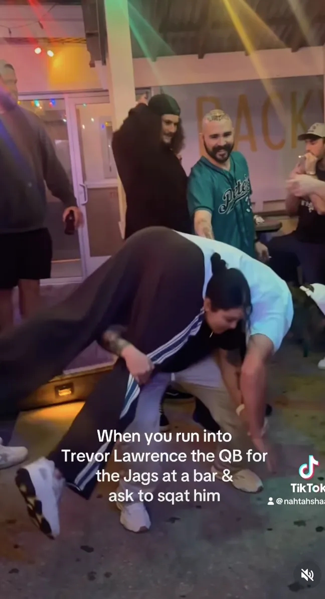 Jaguars Fan Sees Trevor Lawrence at Bar Does Squats With Him on Her Back