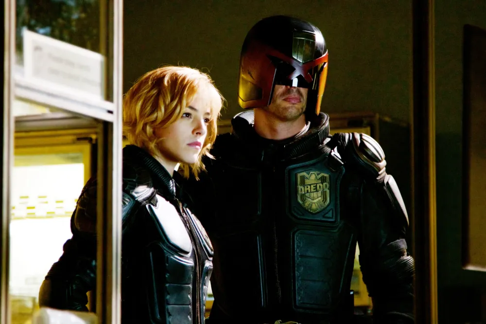Olivia Thirlby and Karl Urban in Dredd