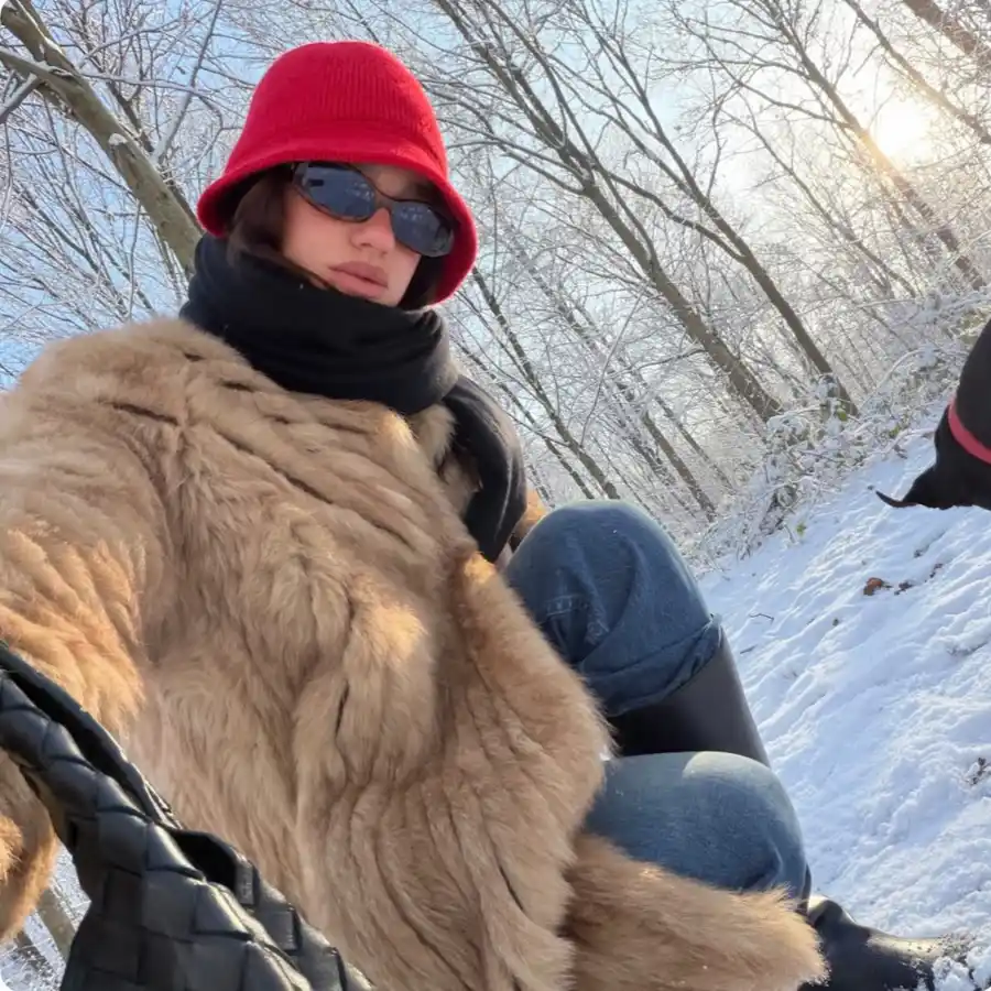 Stars’ Best Bundled Up Looks in Winter: Dua Lipa’s Furry Jacket, Olivia Culpo’s Coat and More