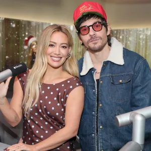LOS ANGELES, CALIFORNIA - DECEMBER 04: (L-R) Hilary Duff and Matthew Koma live on air at Apple Music Studios during a holiday Apple Music radio takeover on December 04, 2025 in Los Angeles, California. (Photo by Amy Sussman/Getty Images for Apple Music)