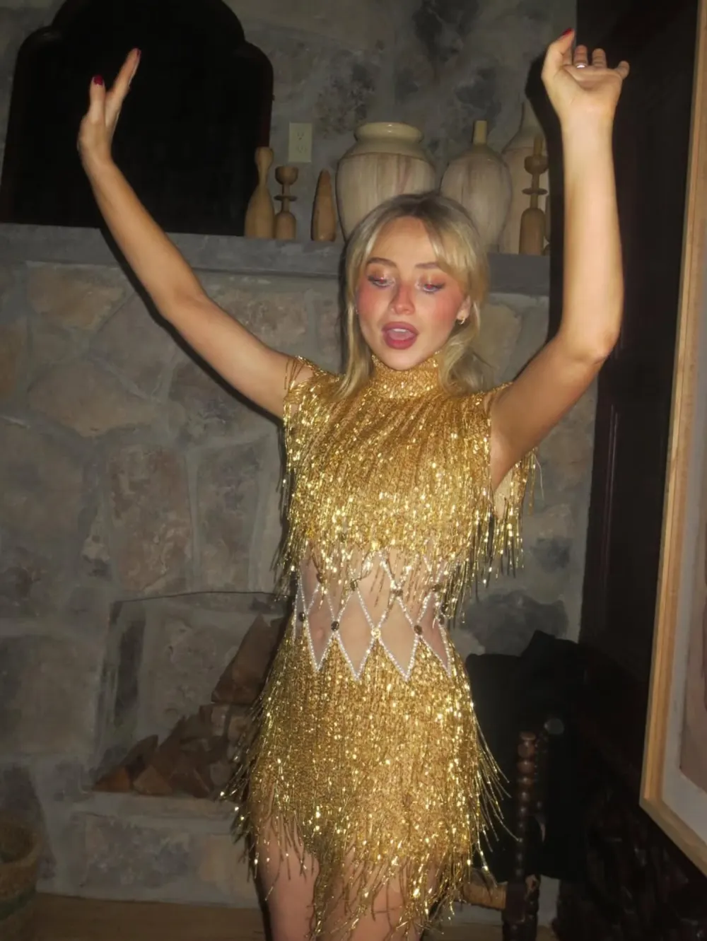 Sabrina Carpenter Shows Off a Silver Thong Underneath Her Glittering Naked Dress