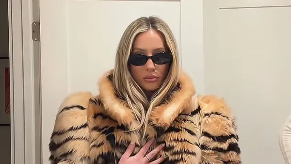 Feature Alix Earle Rocks 51K Gucci Outfit With Tiger Striped Fur Coat and Designer Bag