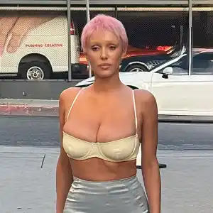 Feature Bianca Censori Debuts Pink Pixie Hair in a Daring Crop Top and Micro Mini Skirt