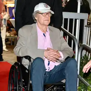 Feature Chevy Chase Appears at Event in Wheelchair