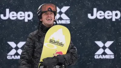 Olympic Snowboarder Taken Off Mountain on a Stretcher Following Violent Crash